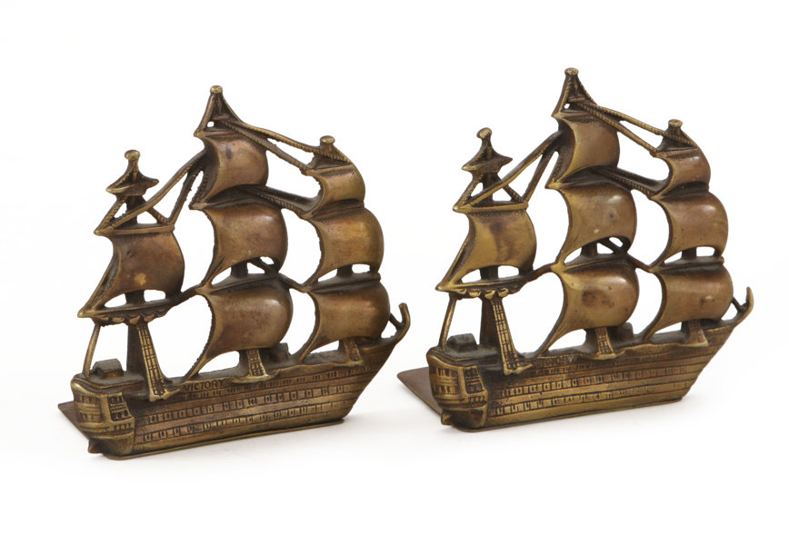 Bokstöd ett par, omkring 1900-talets mitt