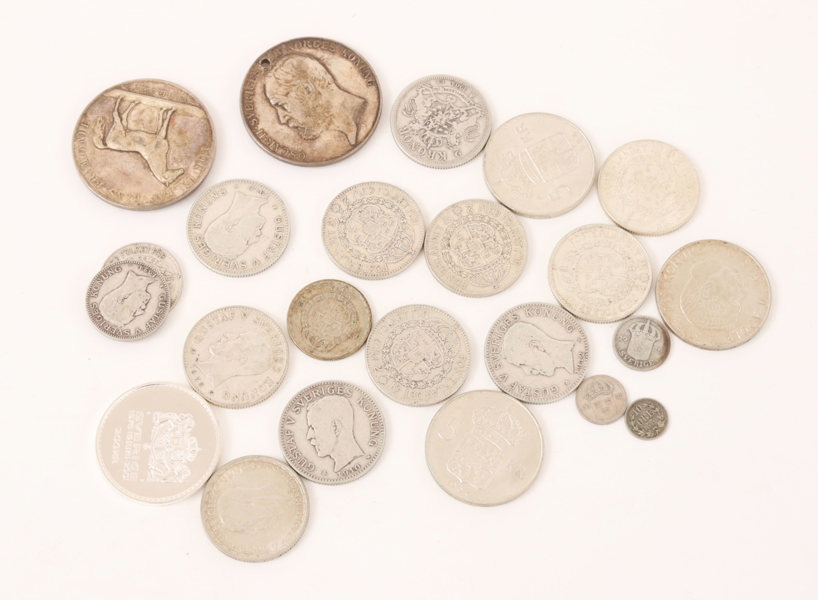 Parti silvermynt och medaljer