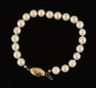 Pärlarmband med lås i 18k