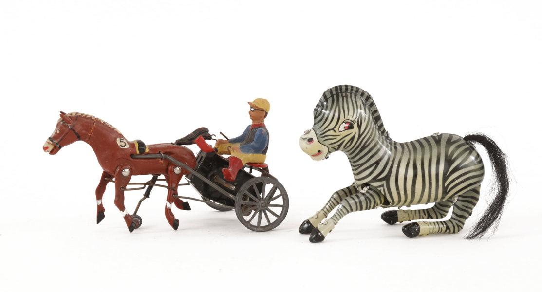 Fjäderdrivna leksaker 2st