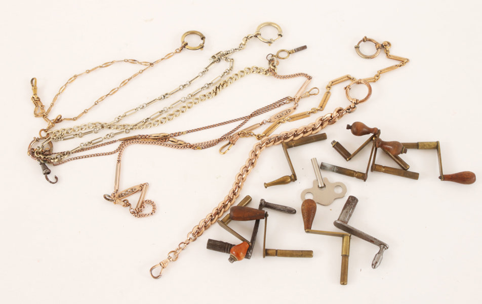 Parti klockkedjor och klocknycklar