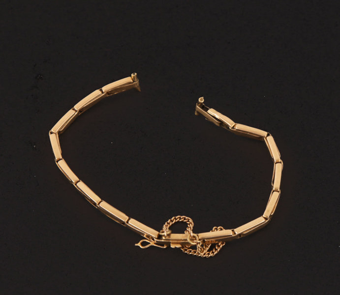 Klockarmband i 18k
