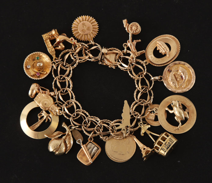 Armband med 19st berlocker, 14k