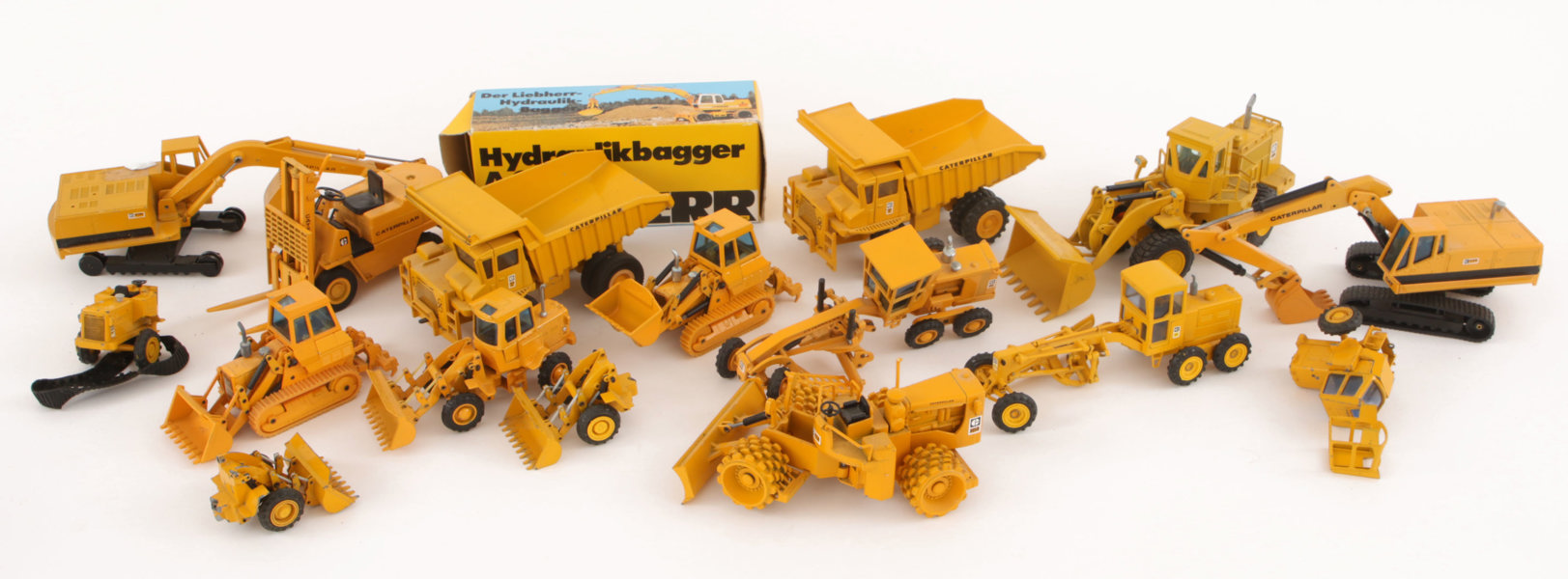 Parti leksakstraktorer och lastbilar, Caterpillar, bl.a. Joal