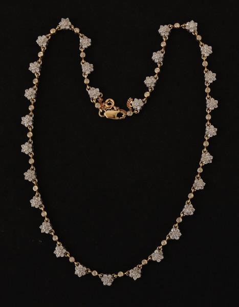 Halsband i 14k röd- samt vitguld, USA