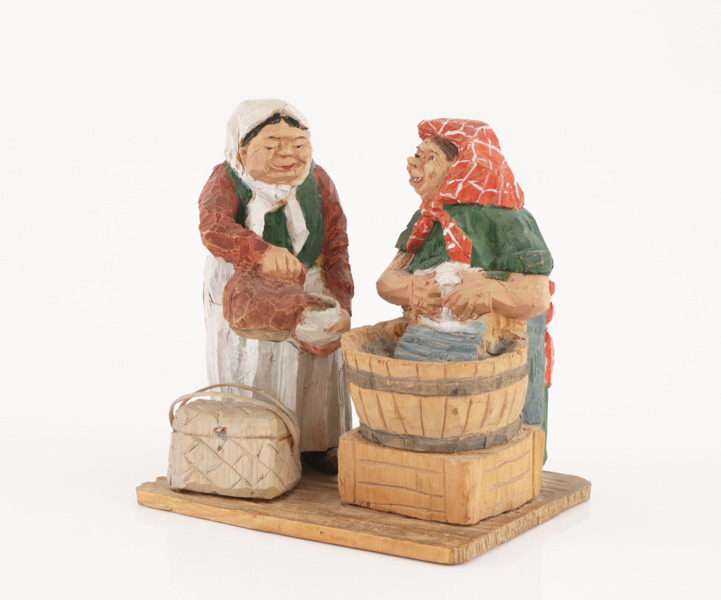 Träskuren figurgrupp, daterad 1938