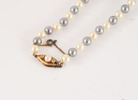Pärlhalsband med lås i förgyllt sterlingsilver