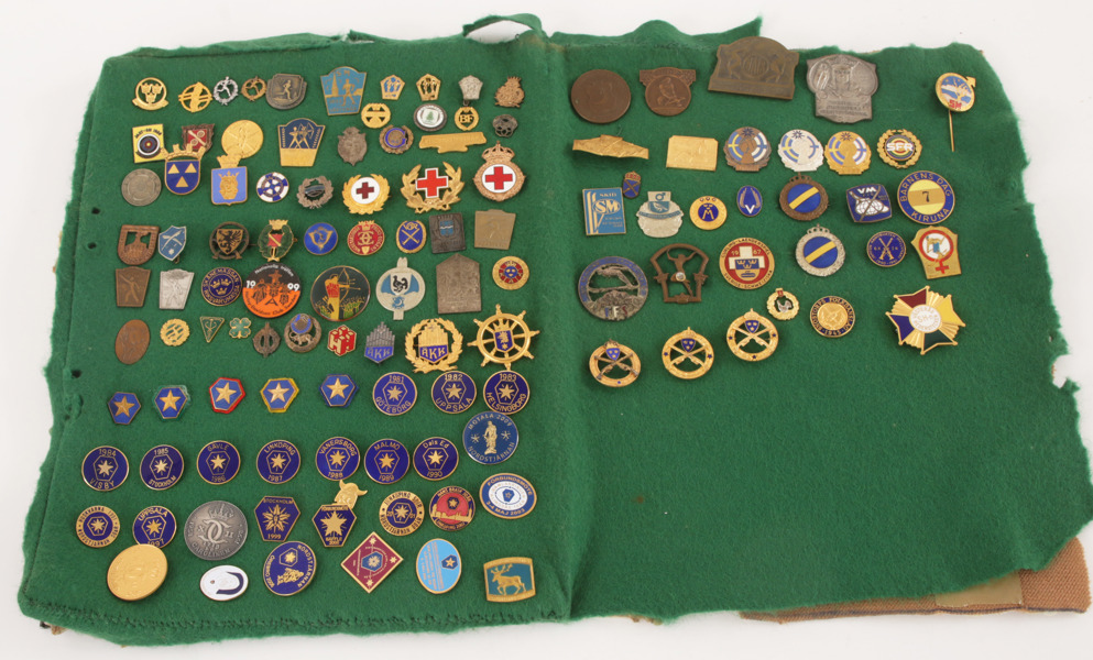 Parti märken och pins, bl.a. rörande idrott