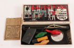 Gummibandspistol, "Bull's Eye Pistol", USA, 1920/30-tal