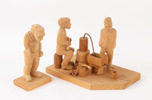 Träskuren figurgrupp i 2 delar