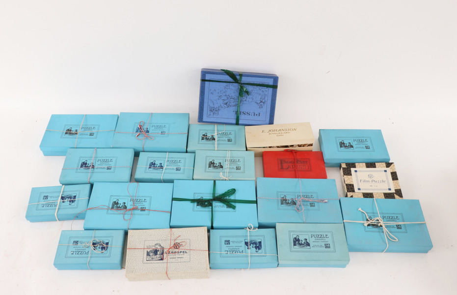 Parti äldre pussel, bl.a. Nordiska Kompaniet, 