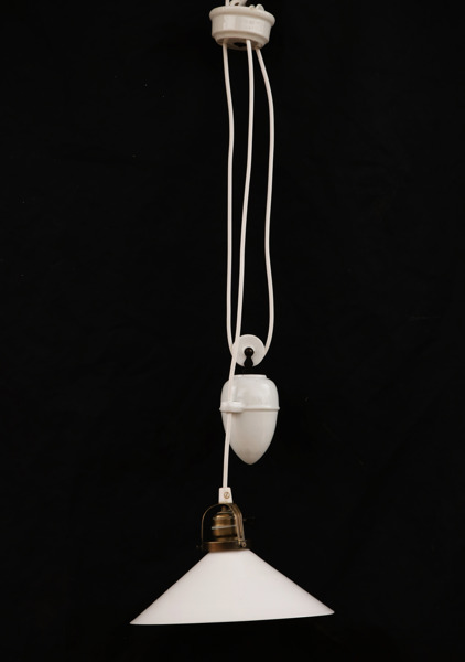 Skomakarlampa med hiss, 1900-talets första hälft