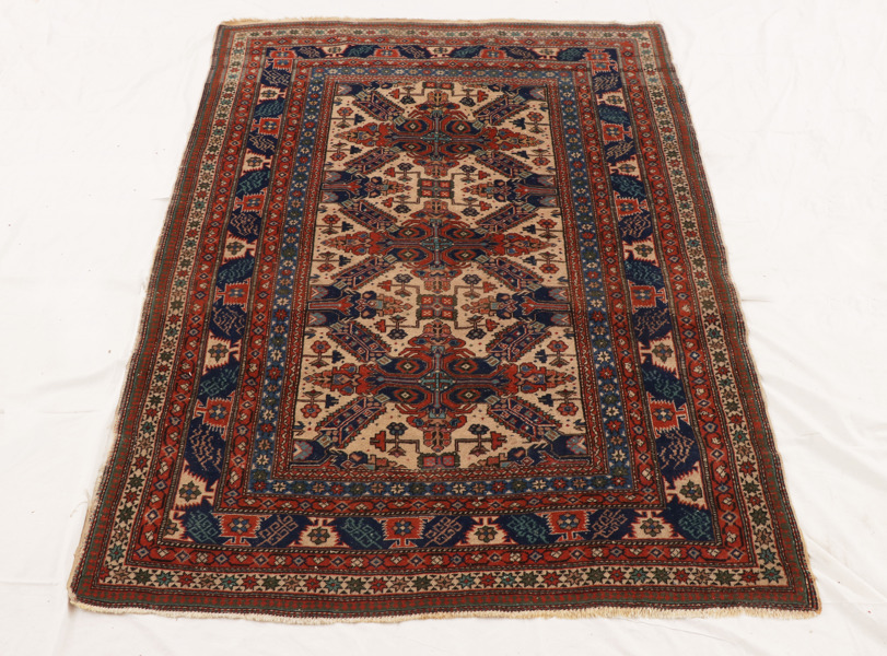 Handknuten matta, orientalisk