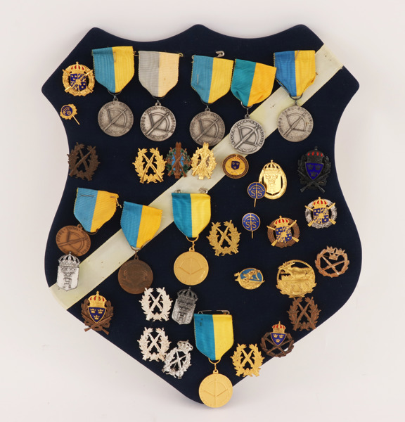 Medaljsköld med medaljer