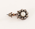 Brosch i 18k och silver