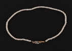Pärlhalsband med lås i 18k