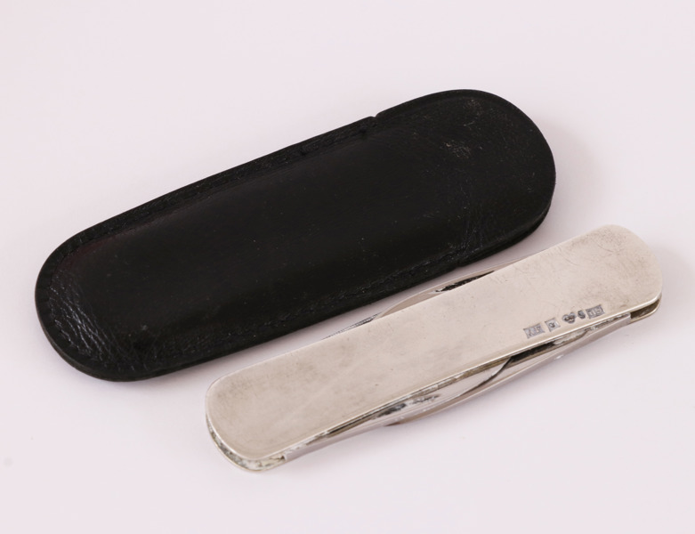 Fickkniv i silver, 1958