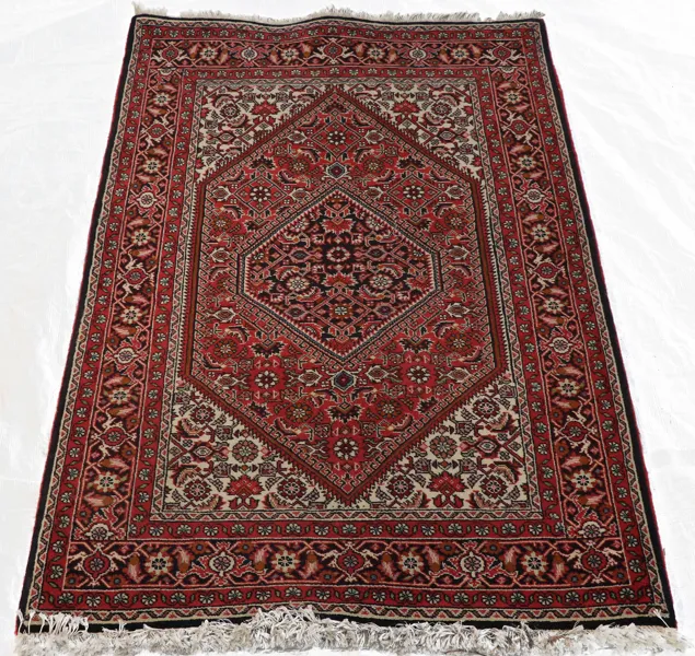 Handknuten matta, orientalisk