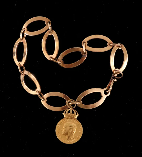 Armband i 18k med medalj, Ateljé Borgila, Stockholm